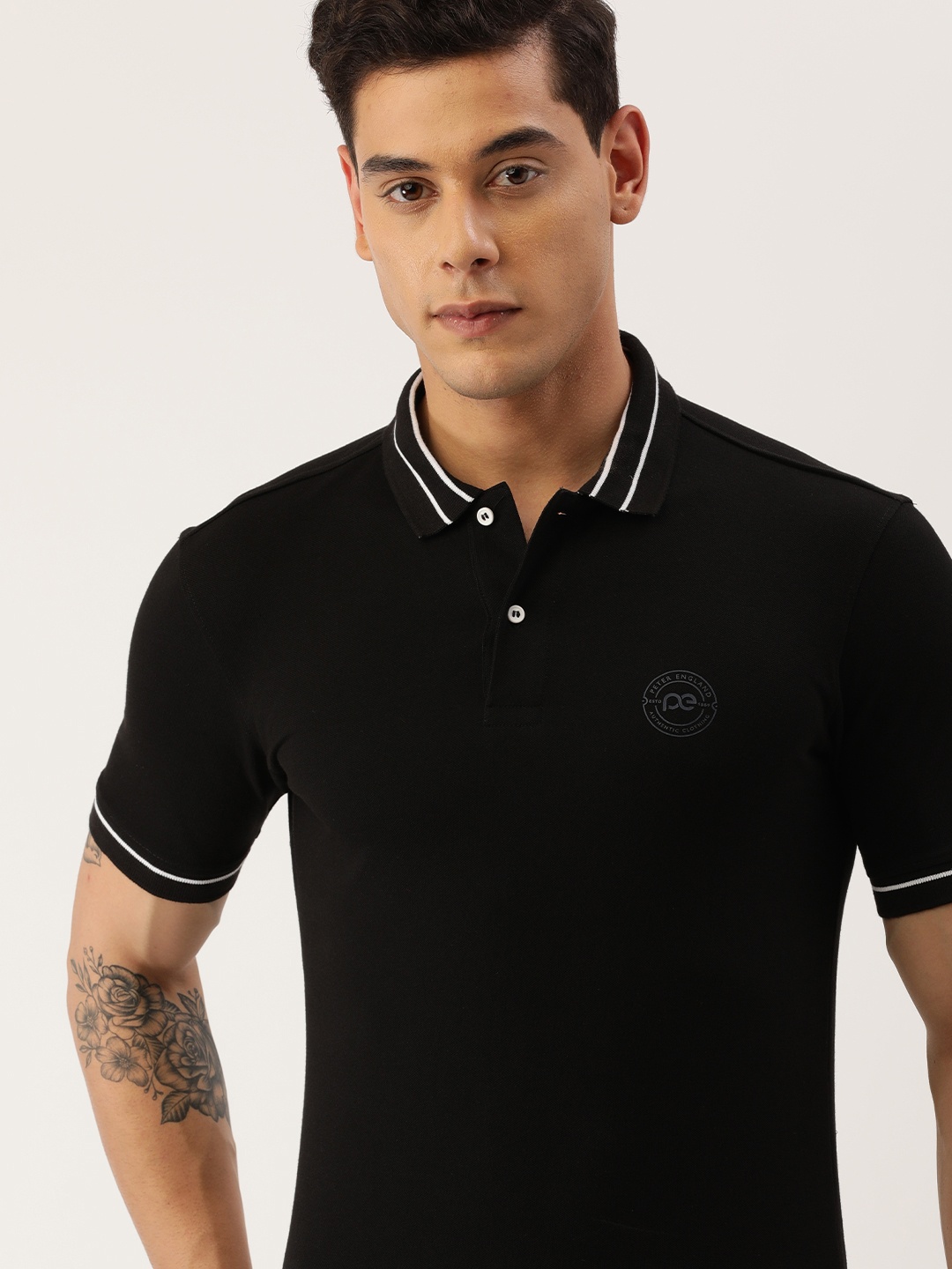 

Peter England Men Black Polo Collar T-shirt