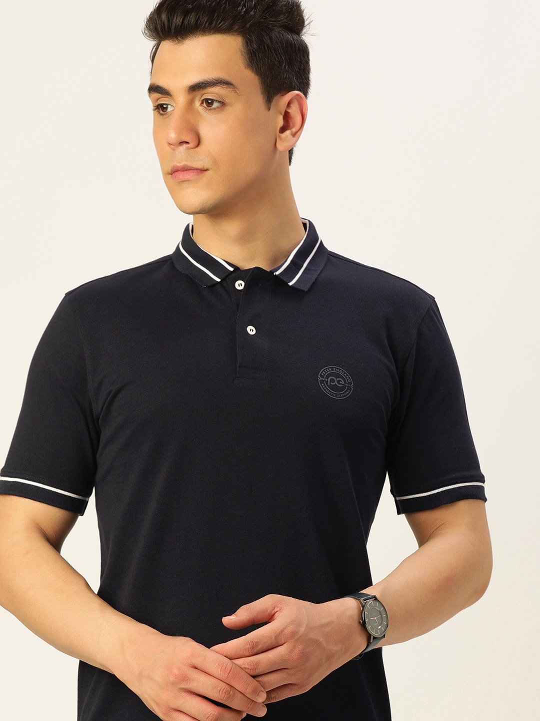 

Peter England Men Navy Blue Solid Polo Collar Casual T-shirt
