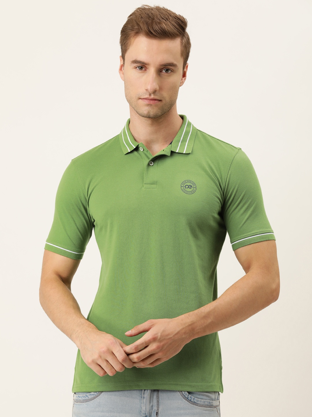 

Peter England Men Green Solid Polo Collar T-shirt