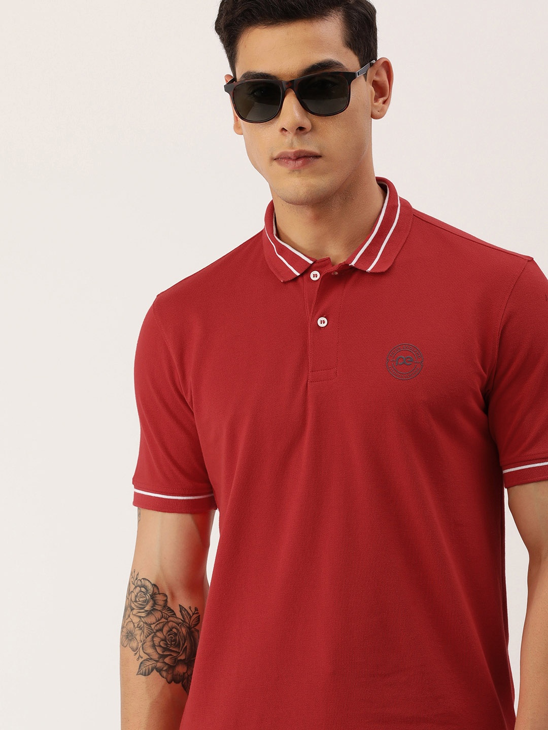 

Peter England Men Red Polo Collar T-shirt