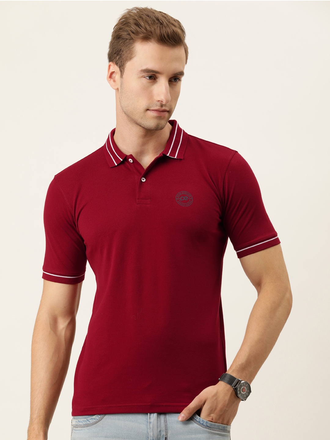 

Peter England Men Maroon Solid Polo Collar T-shirt