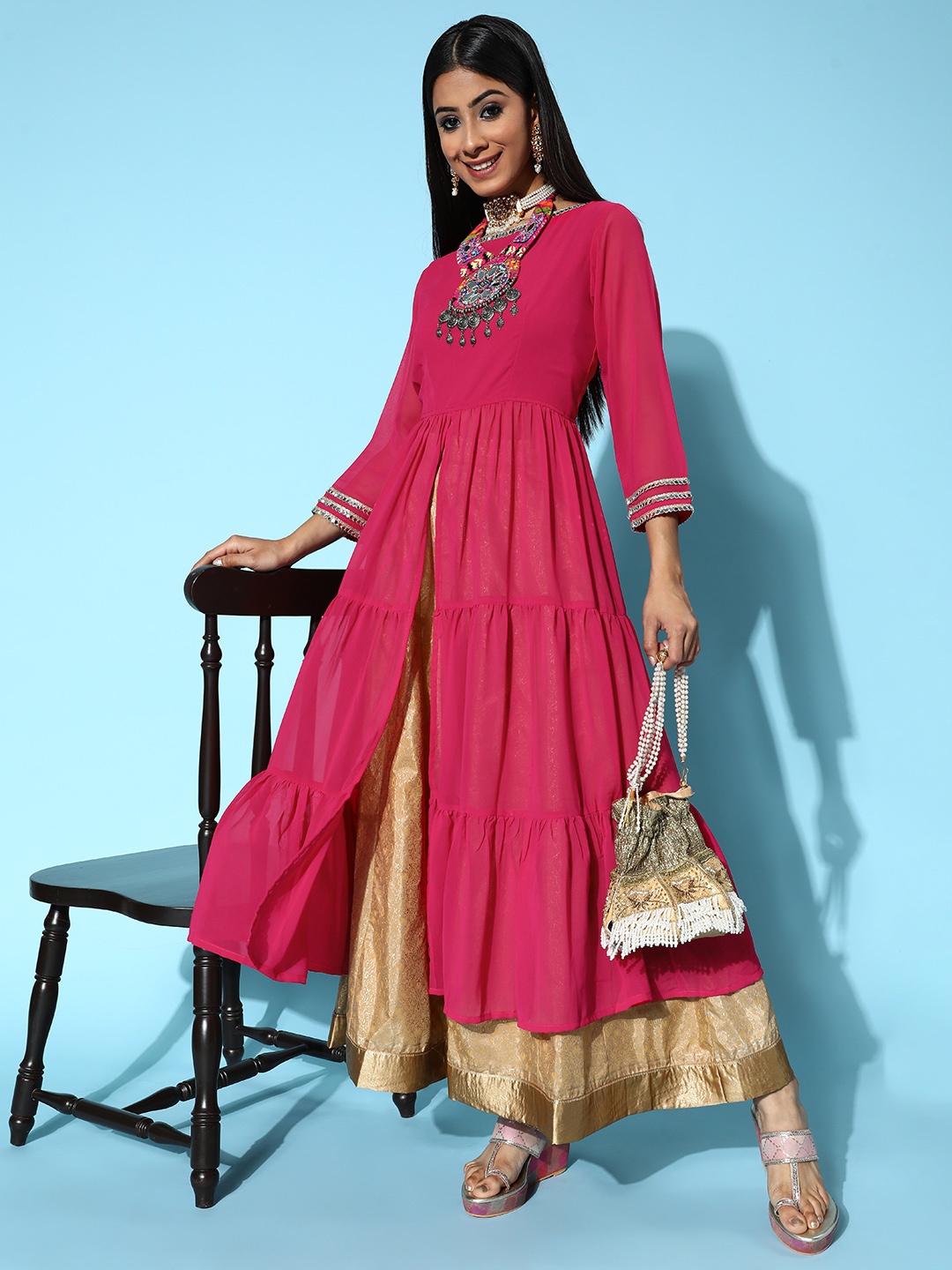 

Inddus Women Magenta Georgette Swirling Volume Kurta