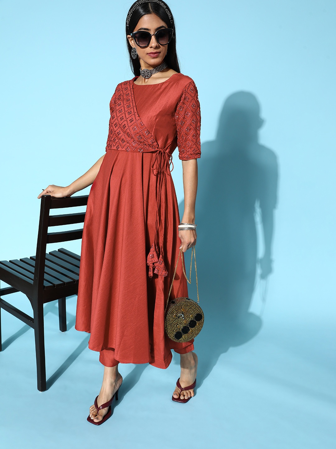 

Inddus Women Abstract Silk Blend Swirling Volume Kurta Set, Rust