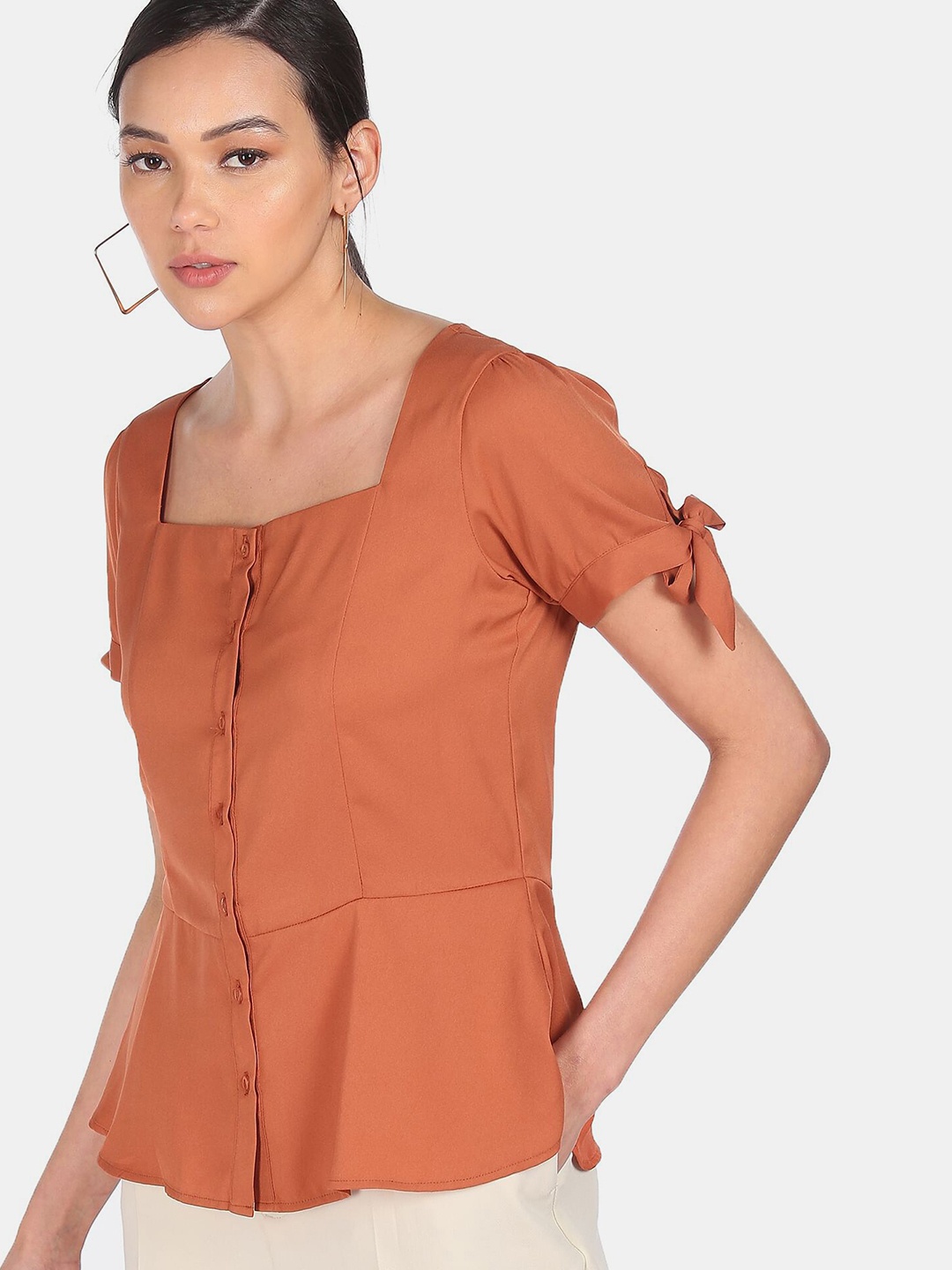 

SHFFL Orange Peplum Top