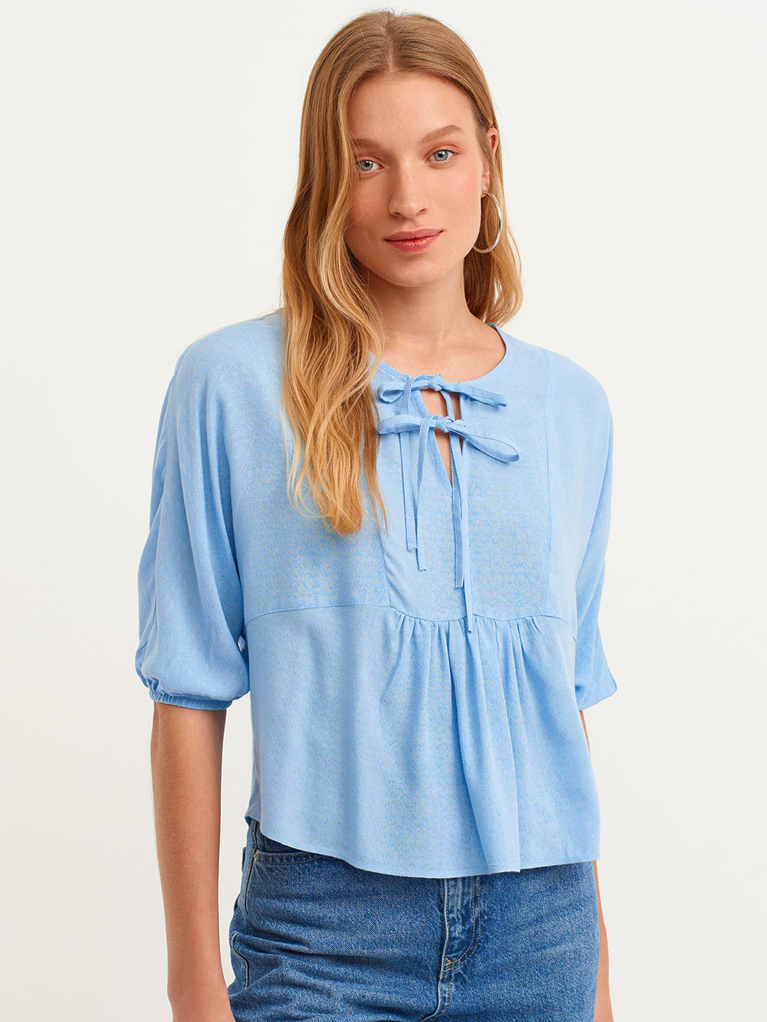 

OXXO Women Blue Self Design Tie-Up Neck A-Line Top