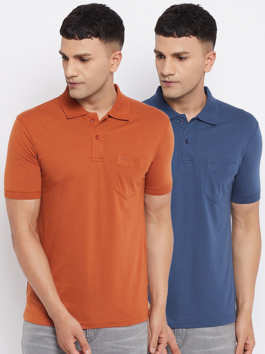 

Okane Pack of 2 Men Rust & Blue Solid Polo Collar T-shirt