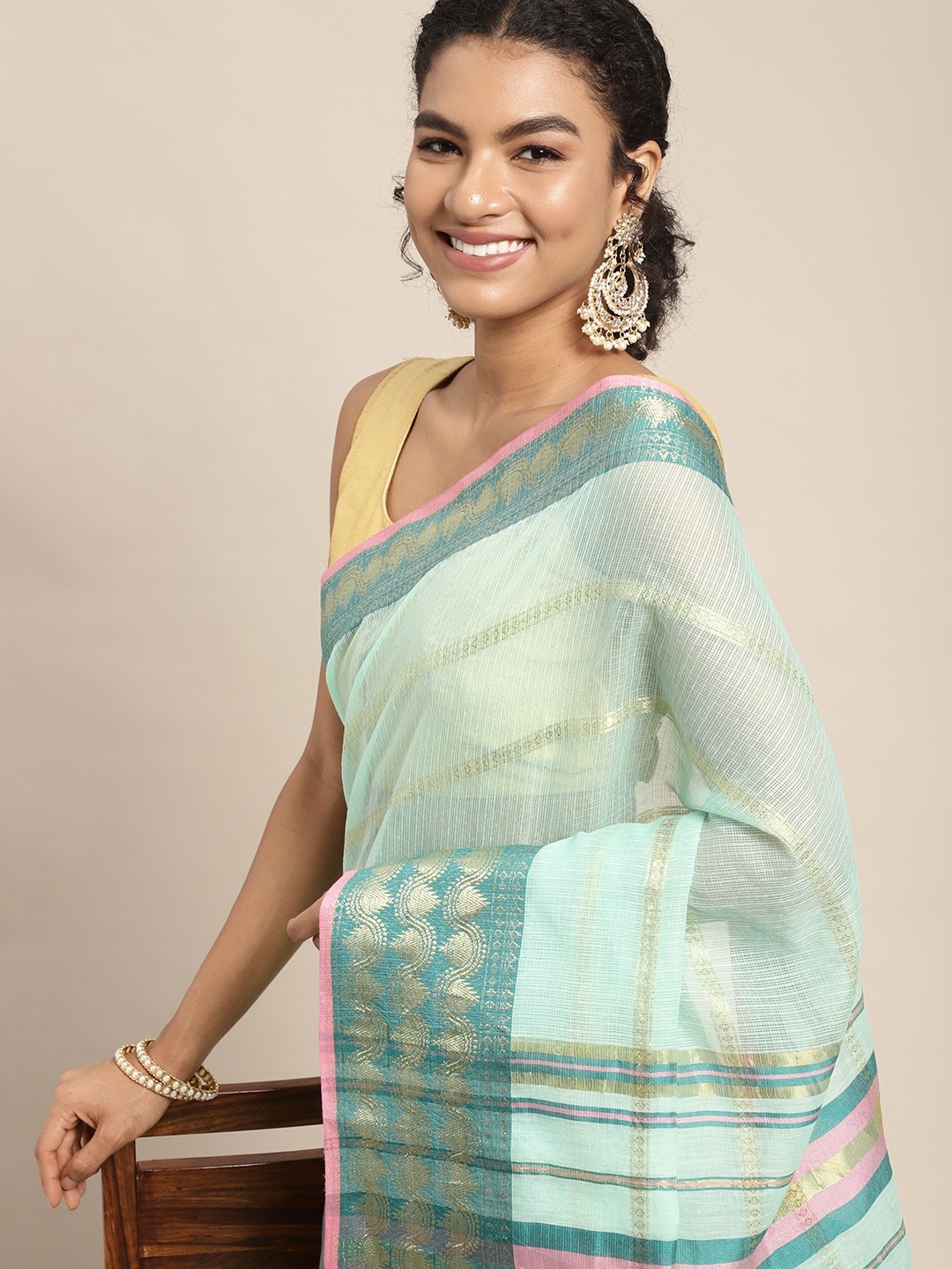 

Leeza Store Sea Green Woven Design Taant Saree