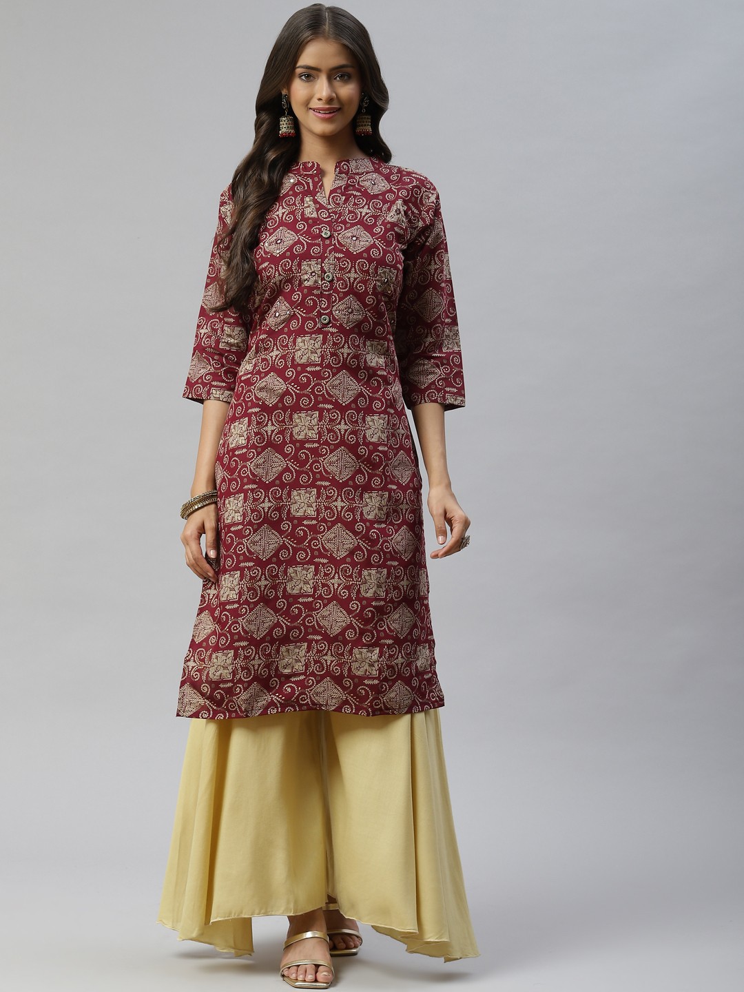 

Aarika Women Maroon & Beige Ethnic Motifs Printed Mirror Work Kurta