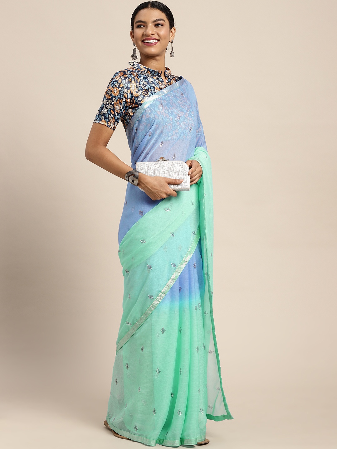 

Satrani Turquoise Blue & Blue Ethnic Motifs Pure Chiffon Saree