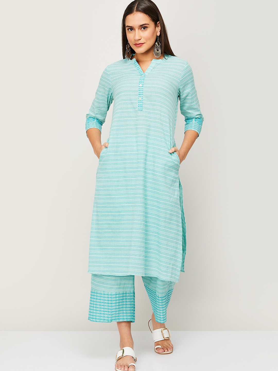 

Melange by Lifestyle Women Blue Striped Panelled Pure Cotton Kurti with Trousers