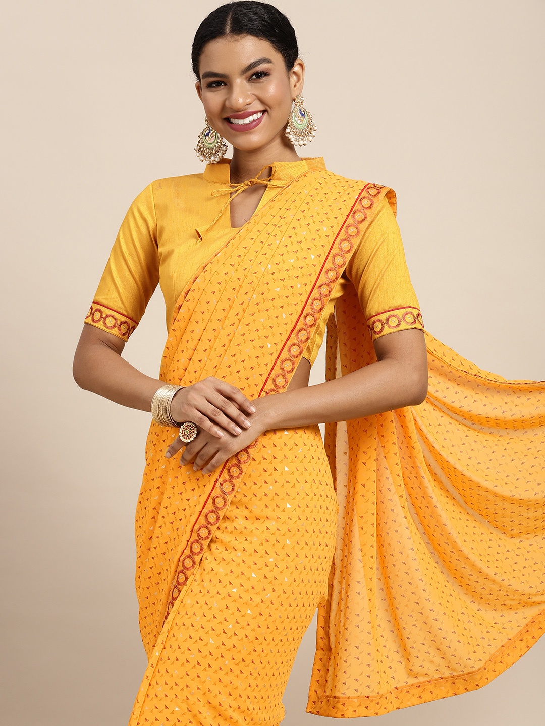 

Satrani Yellow & Red Pure Georgette Saree