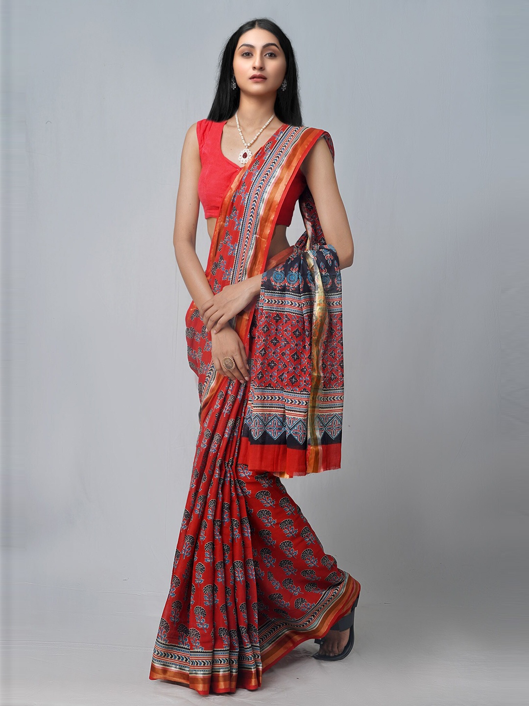 

Unnati Silks Red & Blue Floral Pure Cotton Patola Saree