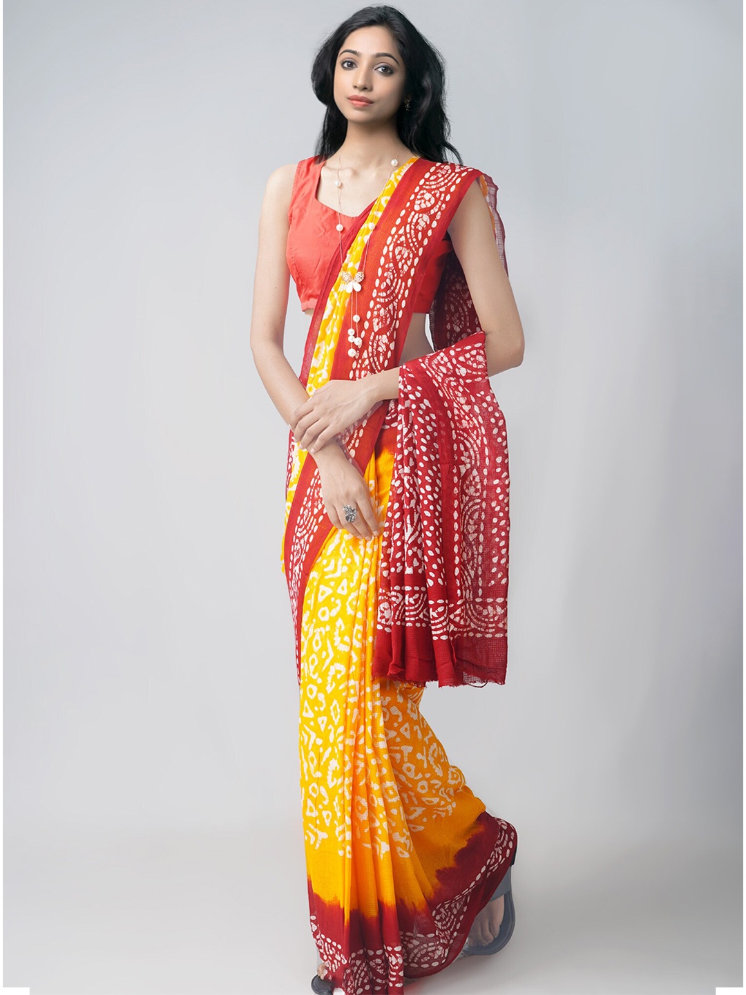 

Unnati Silks Yellow & Red Batik Handloom Sustainable Pure Cotton Kota Saree