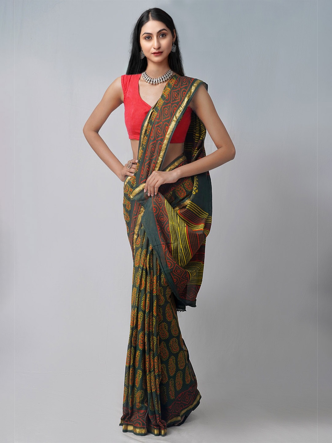 

Unnati Silks Green & Red Ethnic Motifs Zari Patola Saree