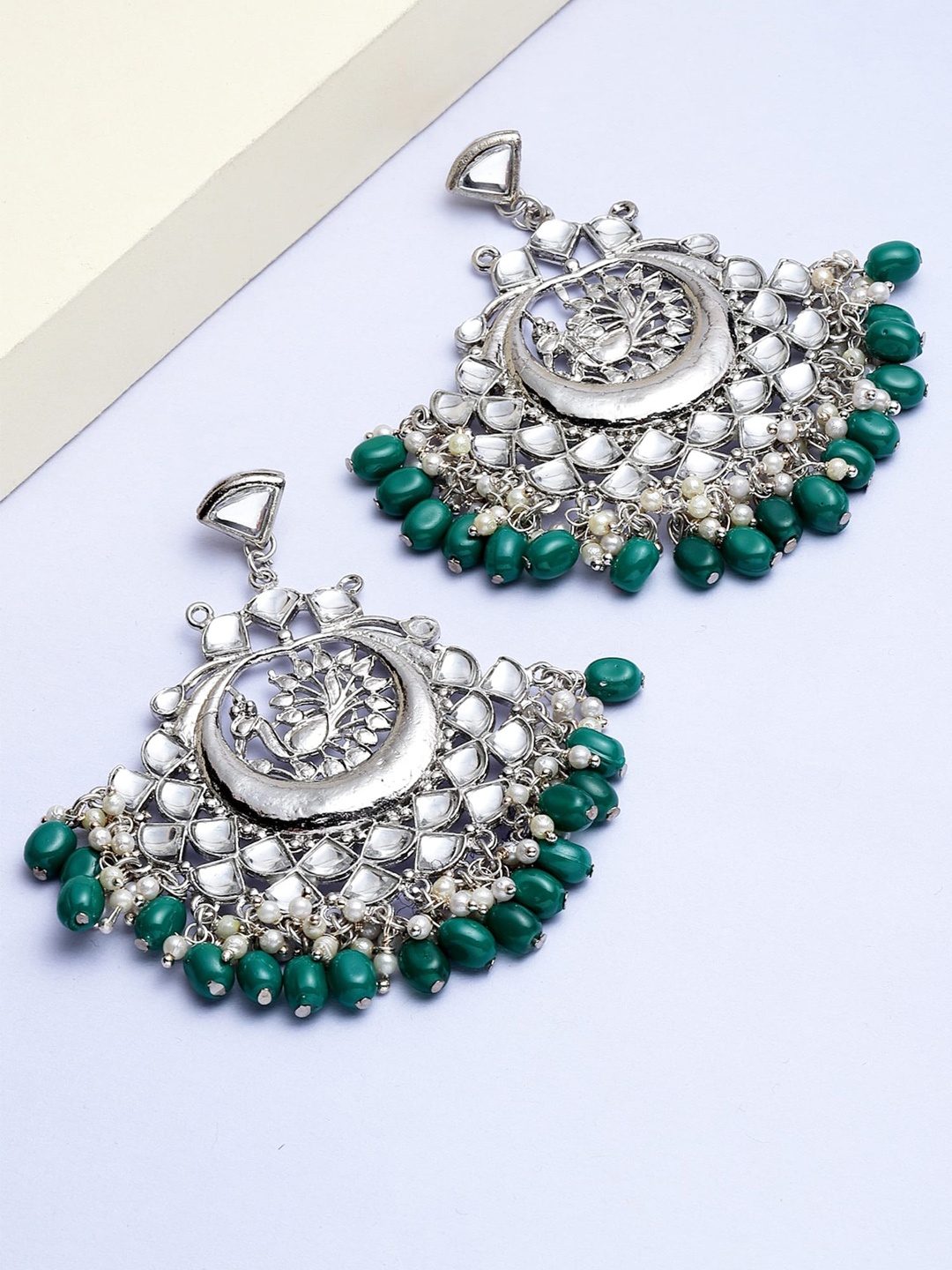 

KARATCART Green & Silver Plated Peacock Shaped Chandbalis Earrings