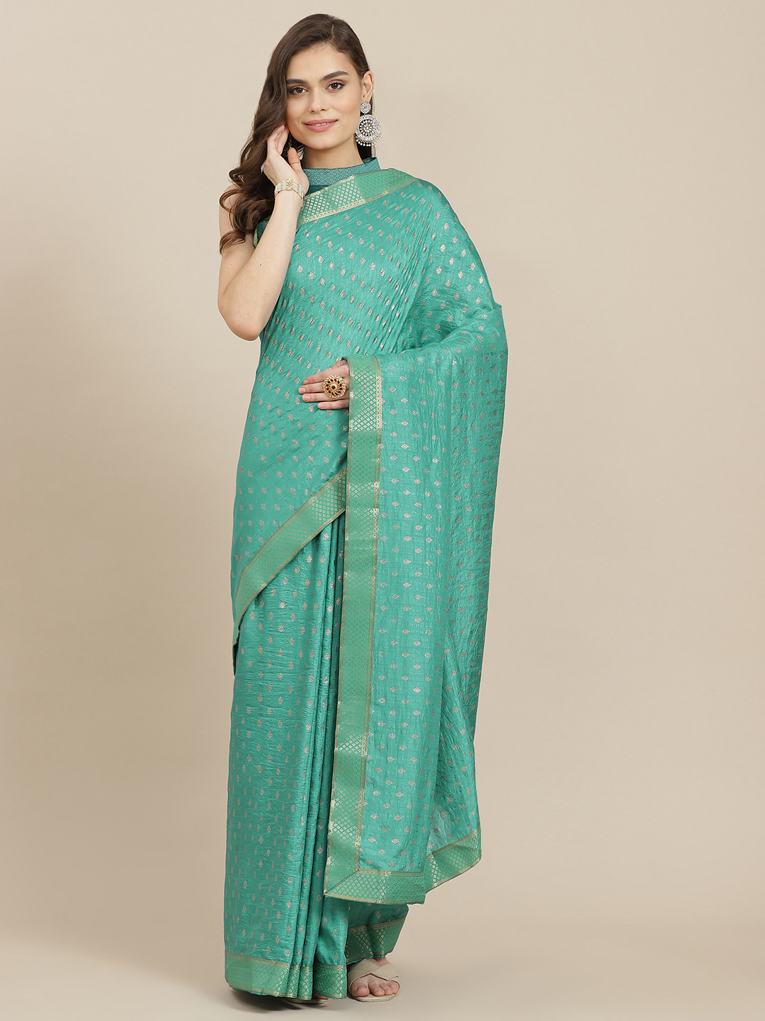

Mitera Sea Green & Golden Ethnic Motifs Art Silk Saree