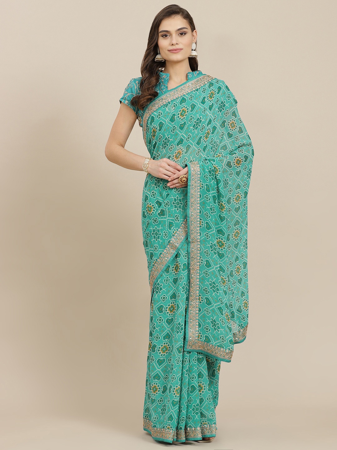 

Mitera Sea Green Ethnic Motifs Sequinned Poly Georgette Saree