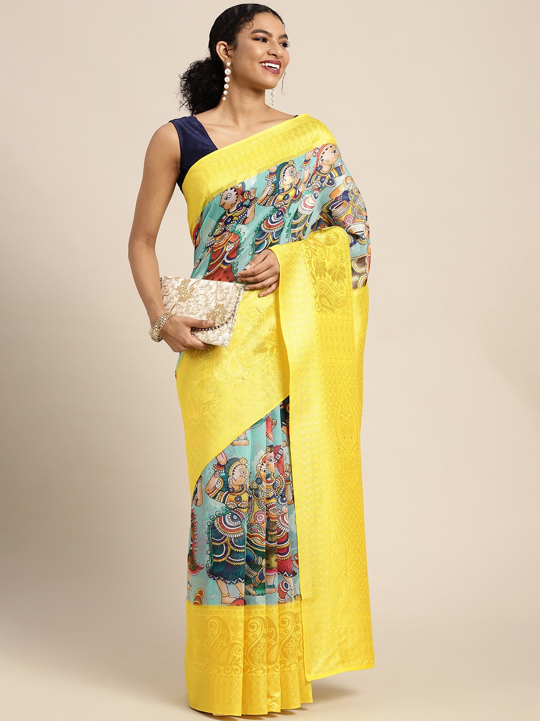 

Silk Land Turquoise Blue & Yellow Kalamkari Zari Saree