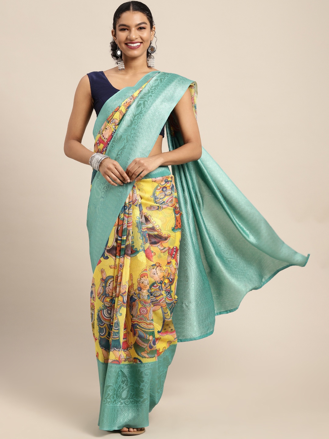 

Silk Land Yellow & Blue Kalamkari Zari Saree