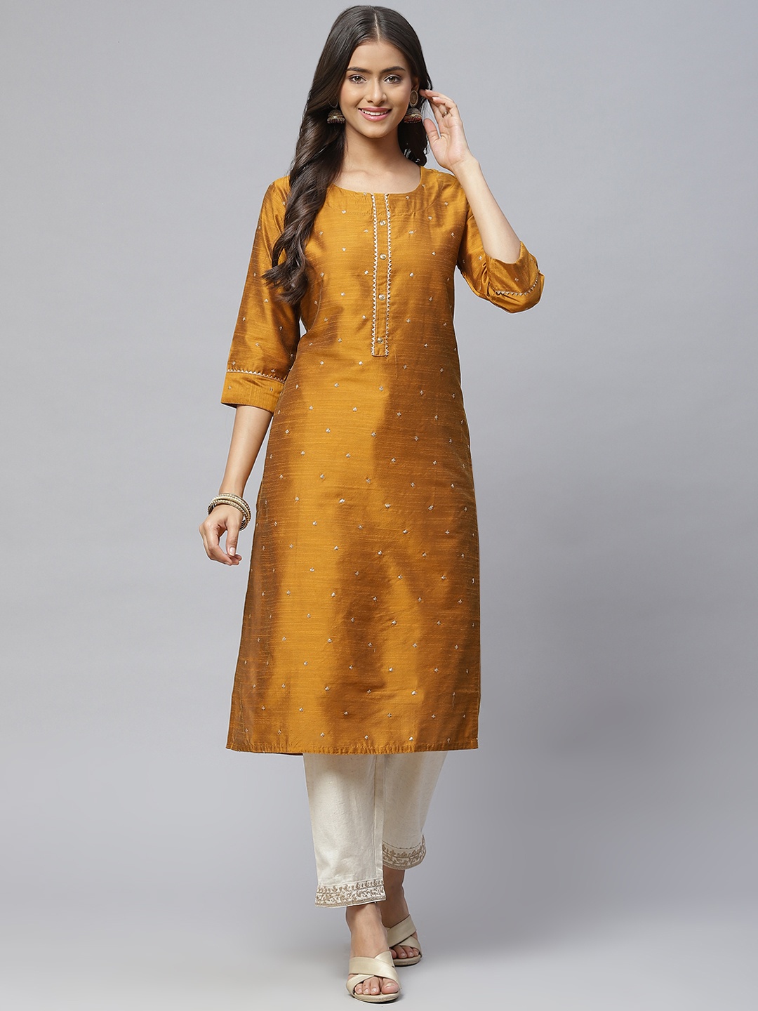 

Aarika Women Mustard Yellow Embellished Pure Cotton Kurta