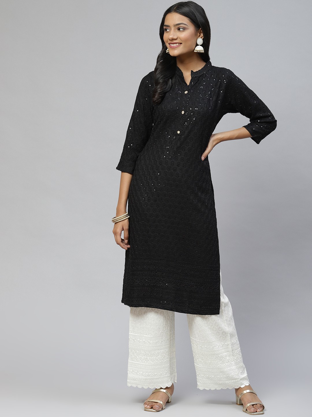 

Aarika Women Black Ethnic Motifs Embroidered Pure Cotton Kurta