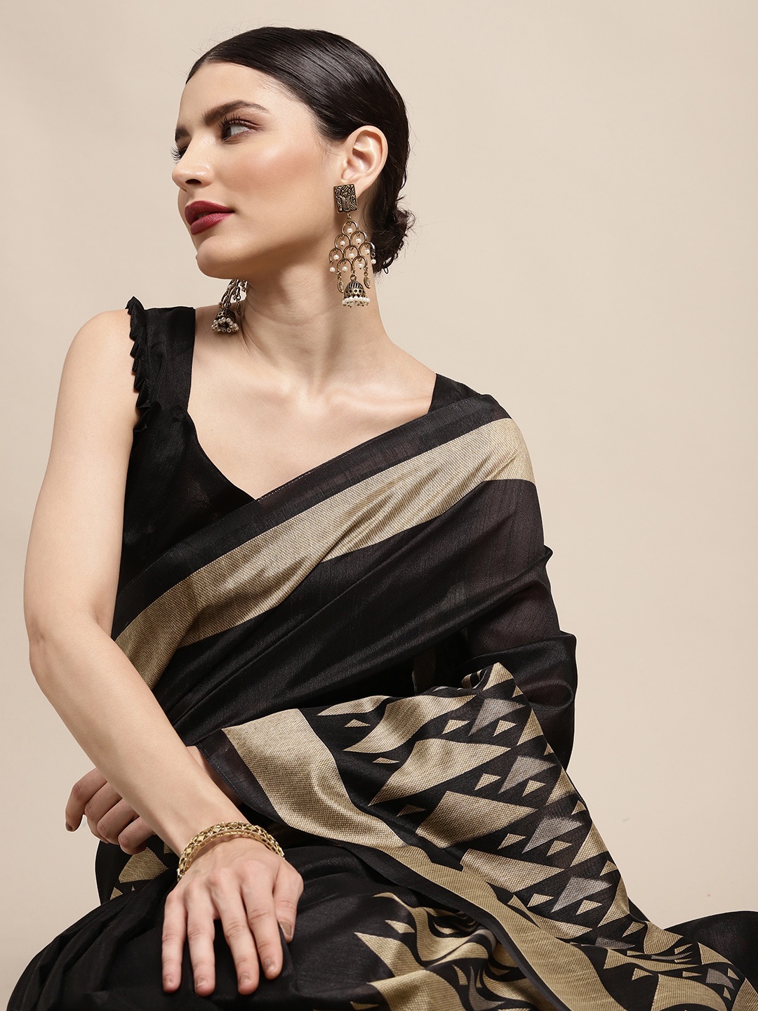 

KALINI Black & Golden Geometric Woven Design Taant Saree