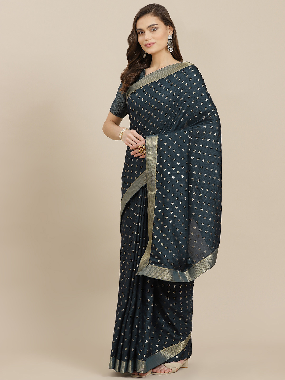 

Mitera Teal Blue & Golden Ethnic Motifs Art Silk Saree