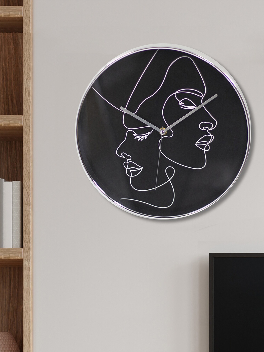

HomeTown Black & White Printed Contemporary Wall Clock
