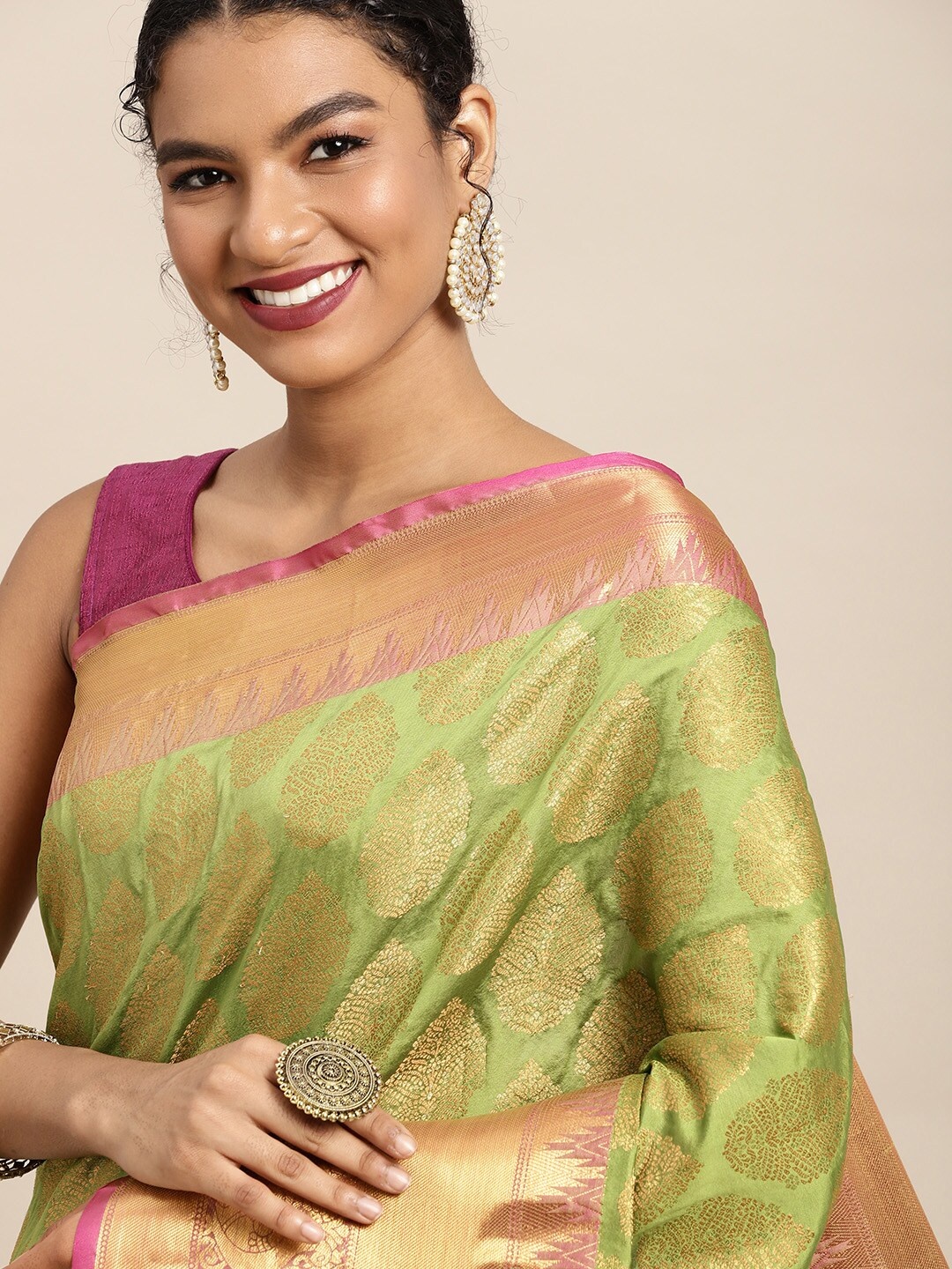 

Silk Land Green & Golden Ethnic Motifs Zari Banarasi Saree