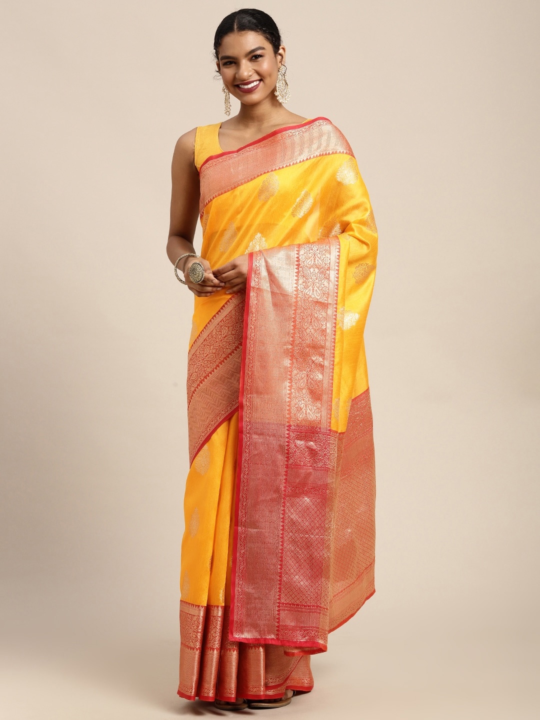 

Silk Land Yellow & Golden Ethnic Motifs Zari Banarasi Saree