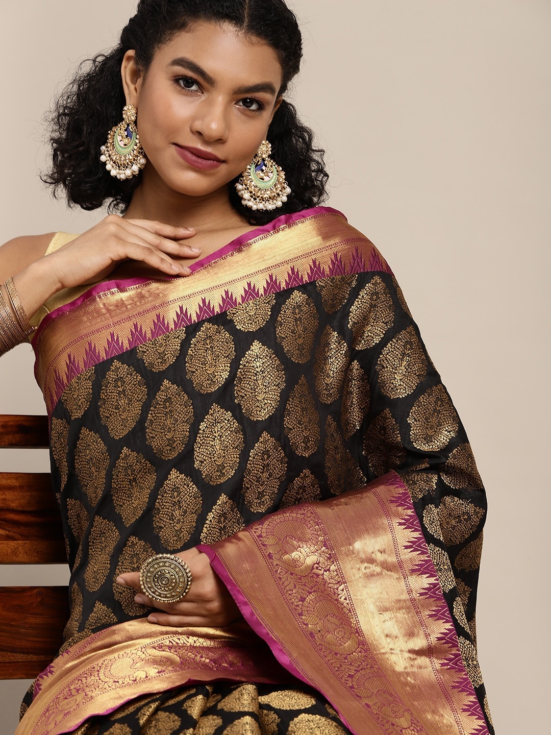 

Silk Land Black & Golden Ethnic Motifs Zari Banarasi Saree