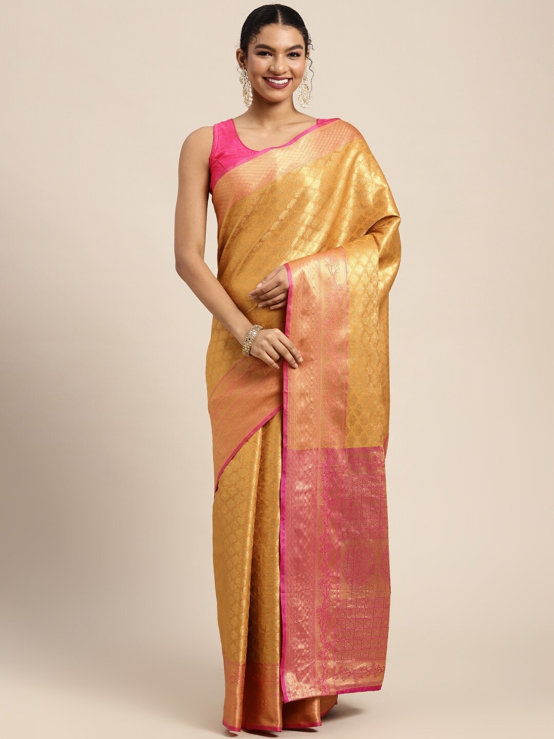 

Silk Land Yellow & Golden Floral Zari Pure Silk Kanjeevaram Saree