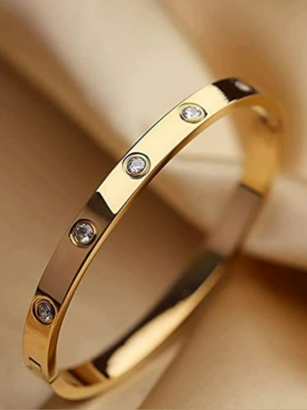 

EL REGALO Women Gold-Toned White Oval Shaped Bangle Bracelet