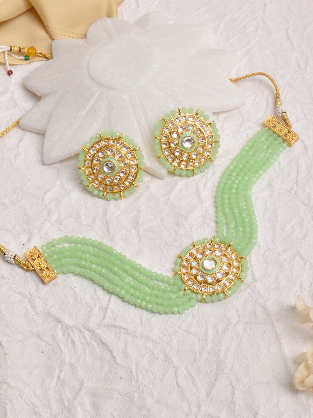 

TEEJH Gold-Plated Green & White Stone Studded & Beaded Jewellery Set