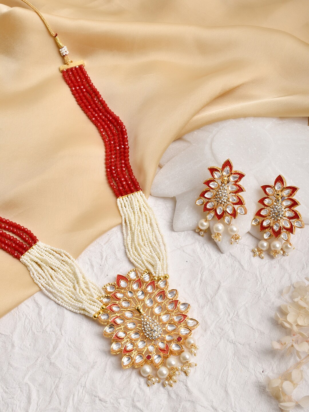 

TEEJH Gold-Plated Red & White Stone Studded & Beaded Jewellery Set
