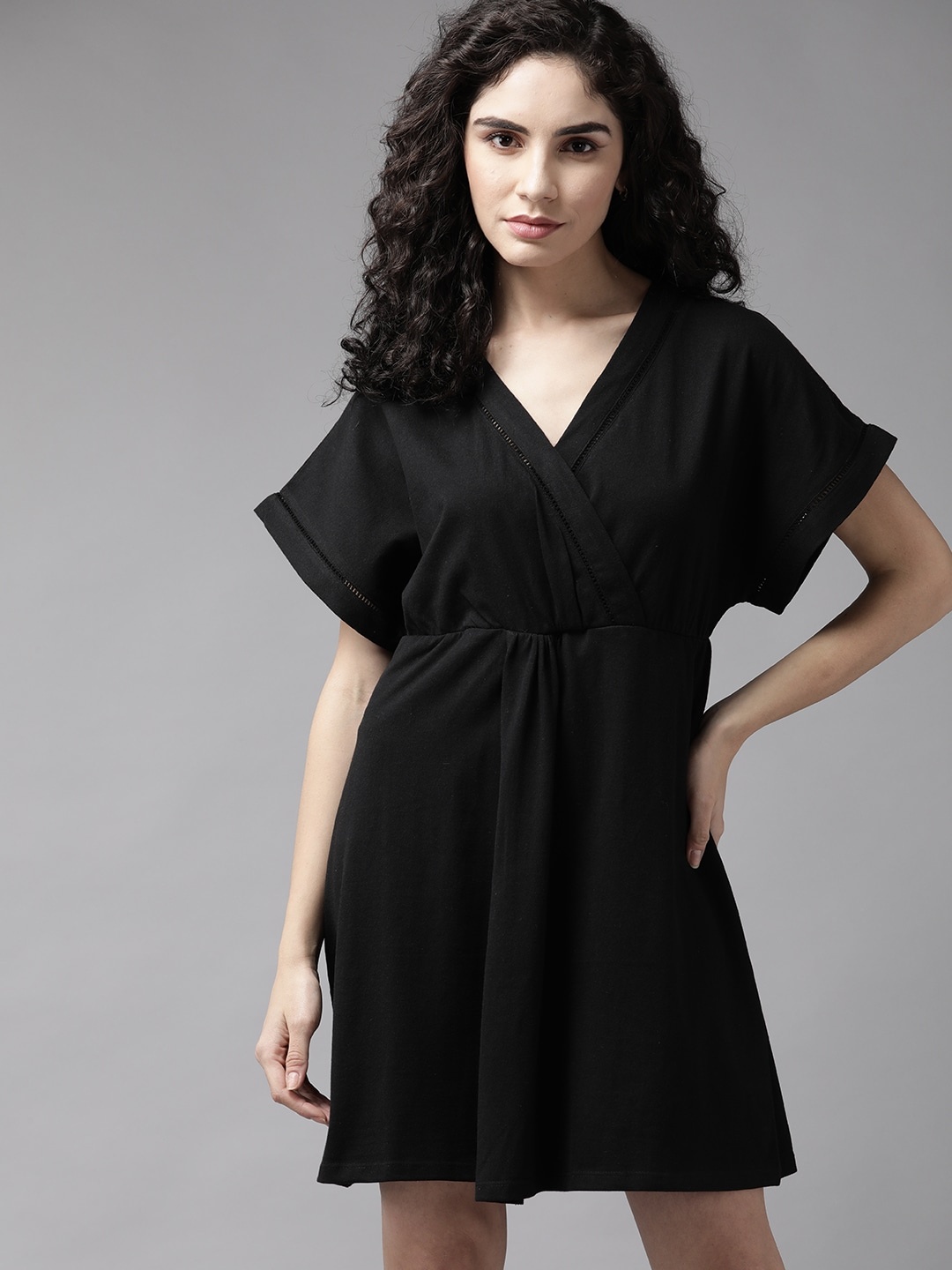 

The Roadster Lifestyle Co. Black Solid Wrap Dress