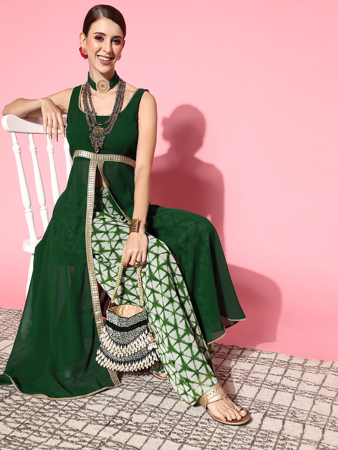 

Inddus Women Green Solid Tunic With Printed Palazzos