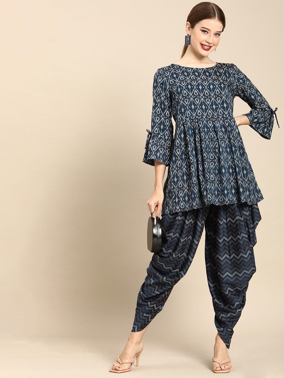 

Anouk Women Navy Blue Ethnic Motifs Printed Empire Kurti with Dhoti Pants