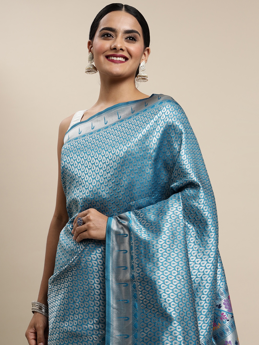 

Mitera Teal Blue Woven Design Zari Silk Blend Paithani Saree