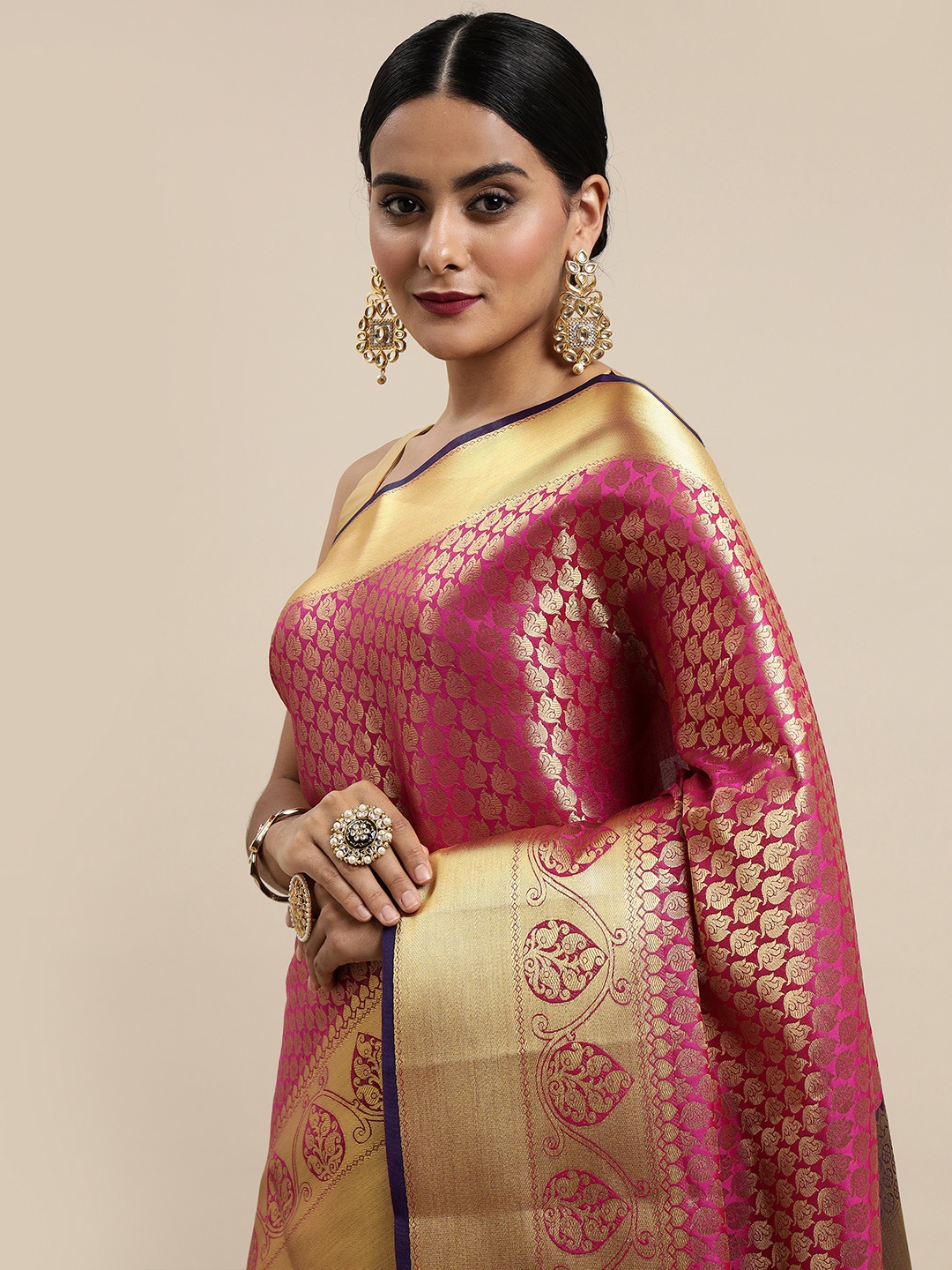 

Mitera Pink & Golden Ethnic Motifs Zari Silk Blend Kanjeevaram Saree