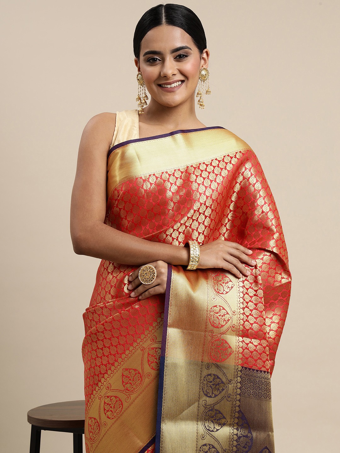 

Mitera Red & Purple Ethnic Motifs Zari Silk Blend Saree
