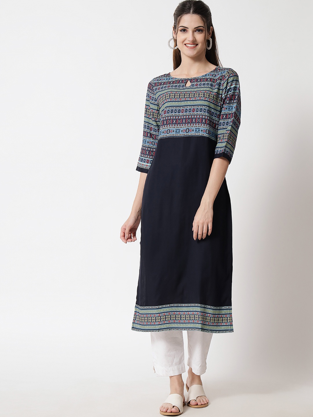 

Shopping Queen Women Navy Blue Ethnic Motifs Yoke Design Keyhole Neck Kurta