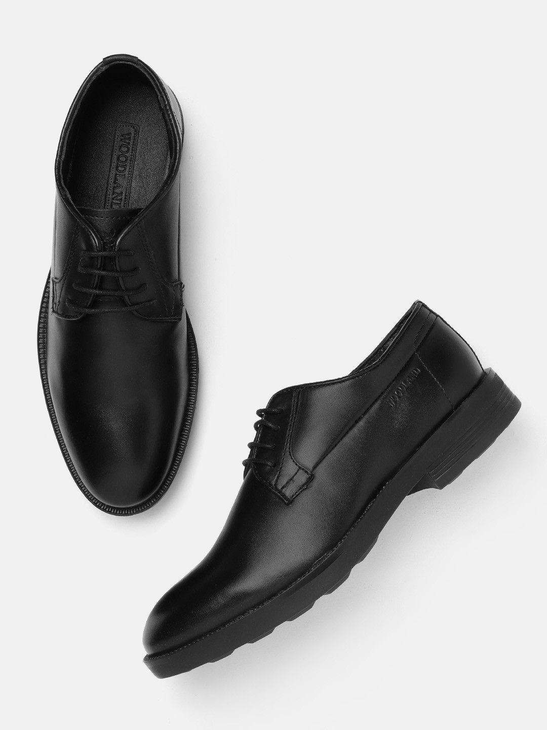 

Woodland Men Black Solid Derbys