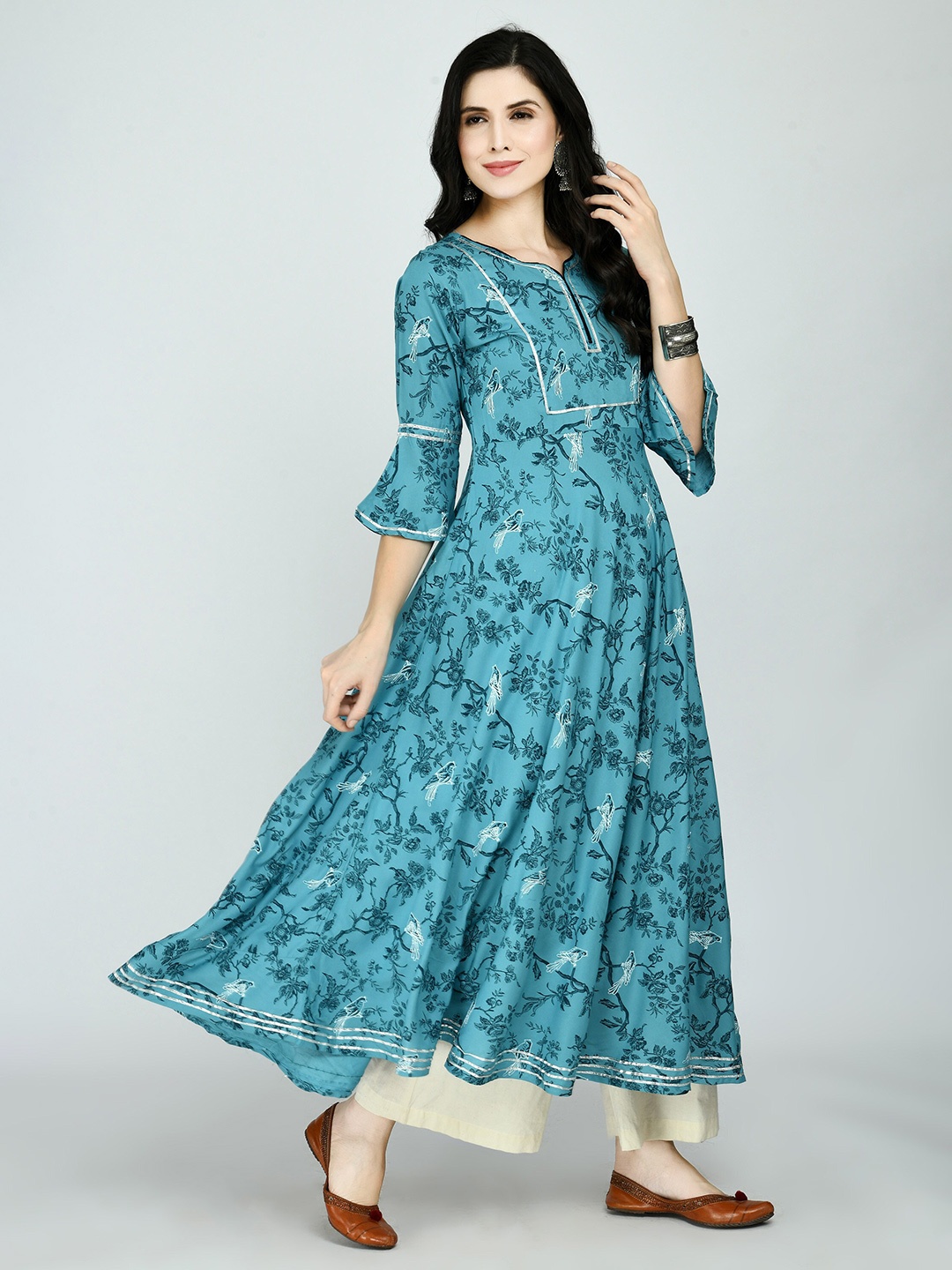 

MAFE Women Turquoise Blue & White Ethnic Motifs Anarkali Kurta