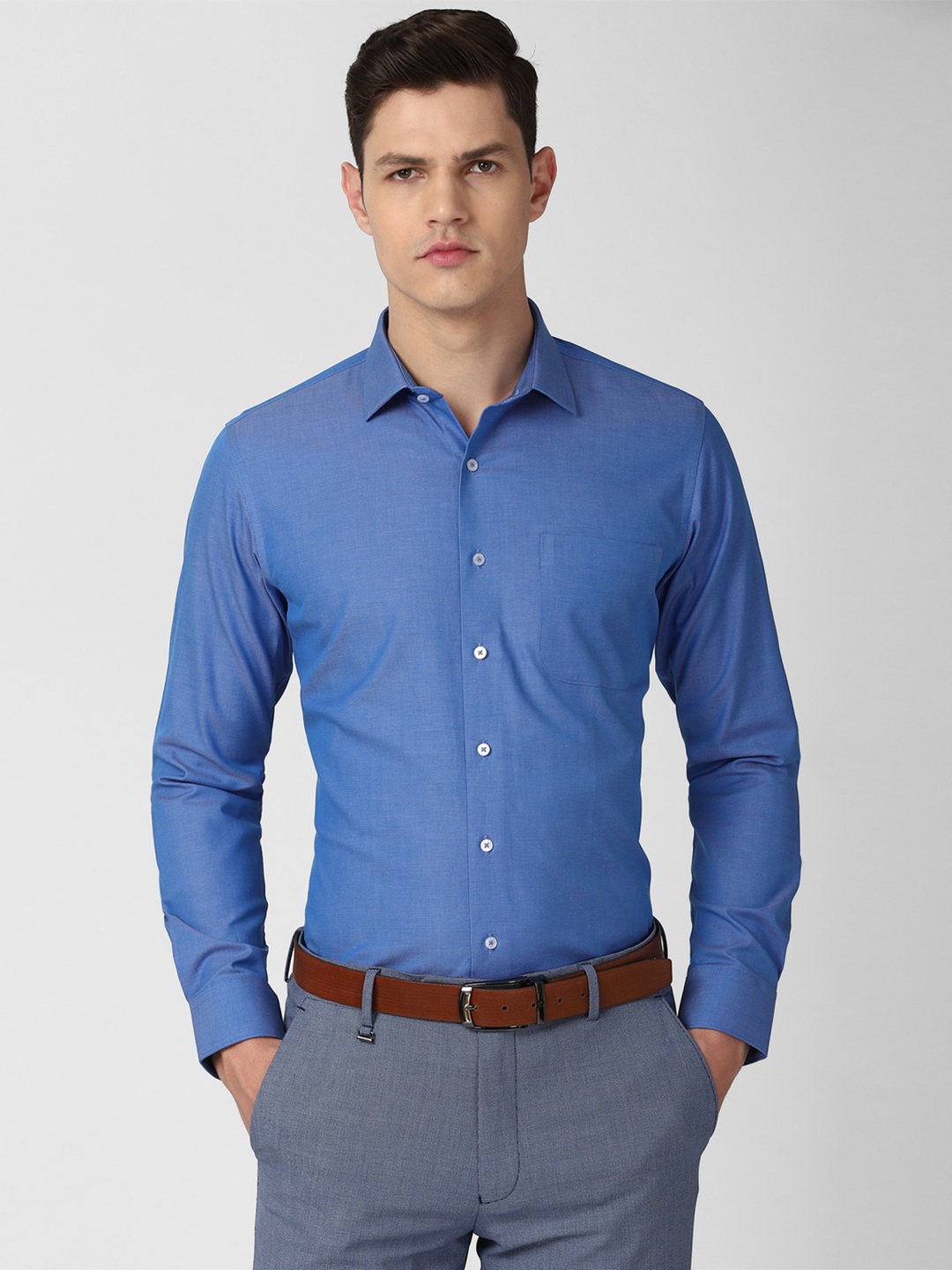 

Van Heusen Men Blue Solid Slim Fit Formal Shirt