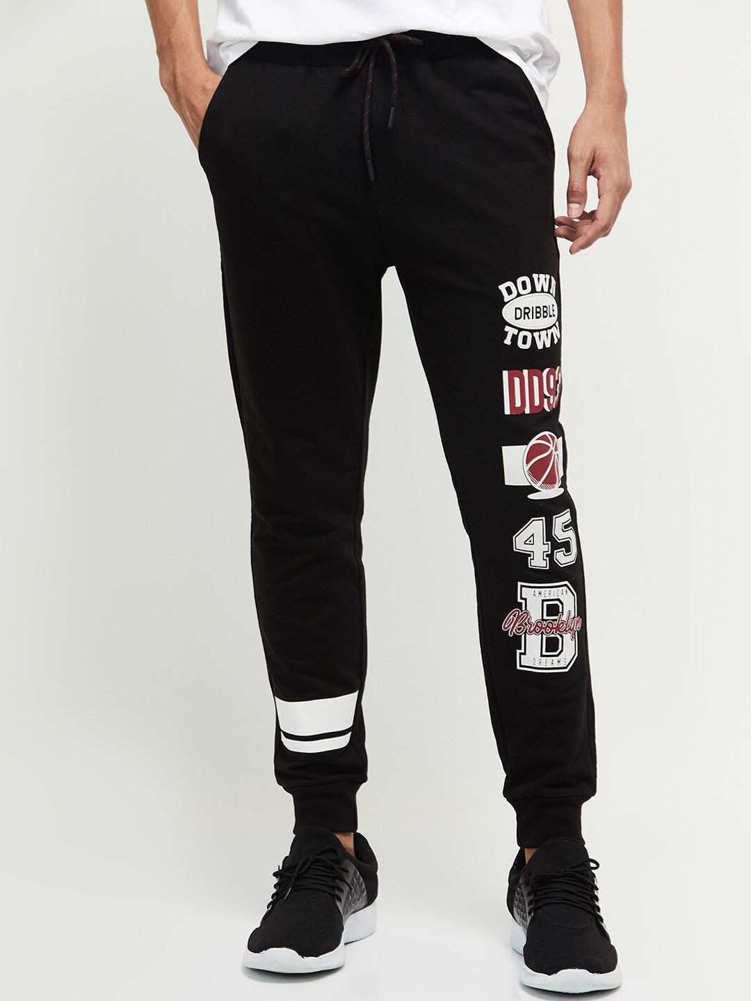 

max Men Solid Black Printed Joggers