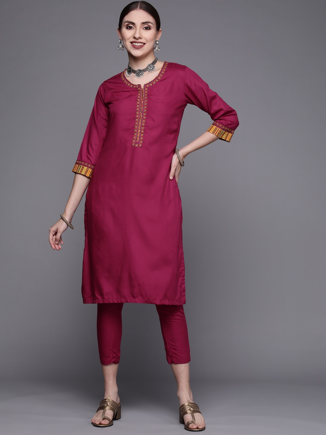 

Biba Women Magenta Yoke Design Thread Work Kurta with Trousers