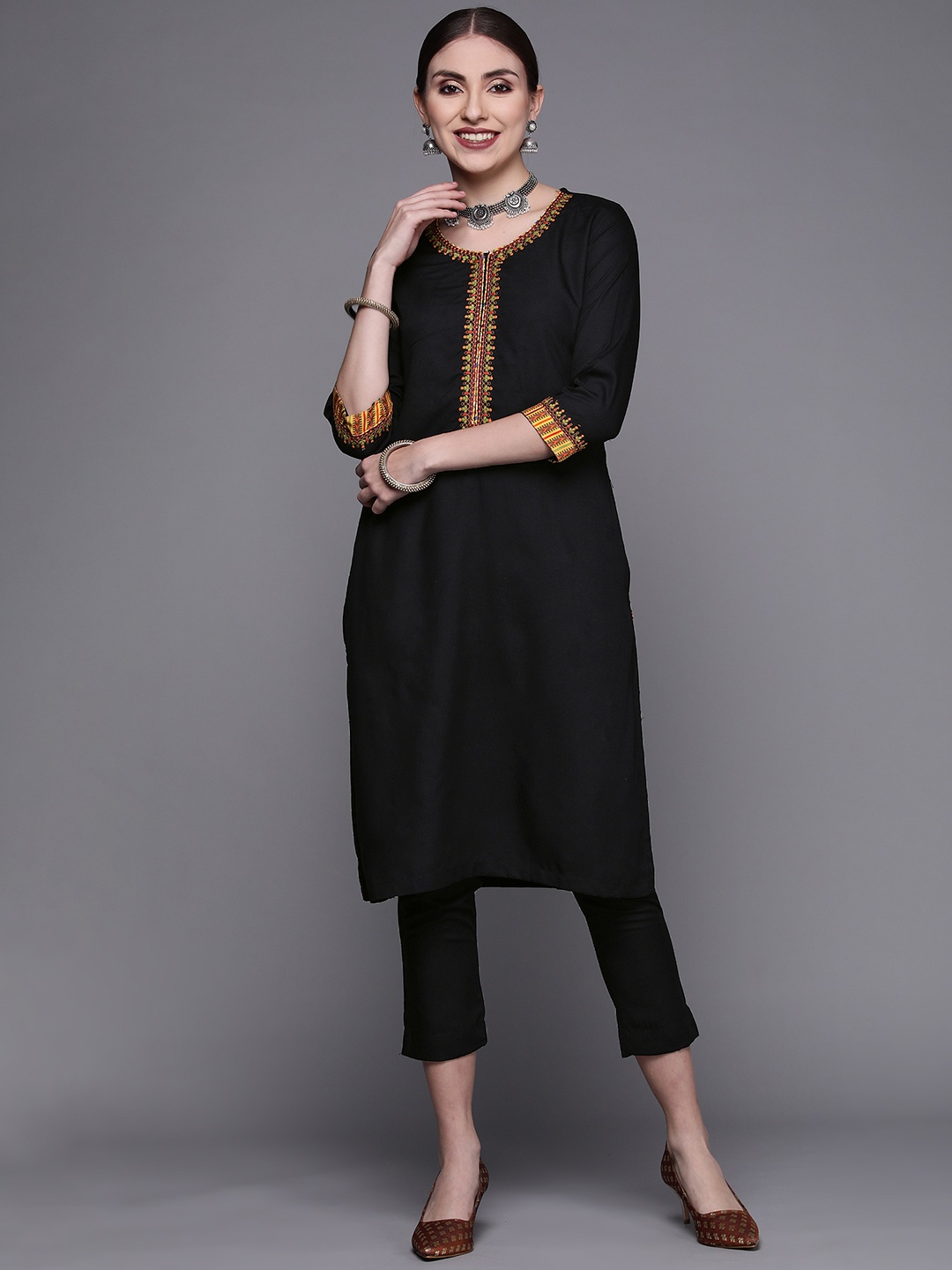 

Biba Women Black Yoke Design Thread Work Kurta with Trousers