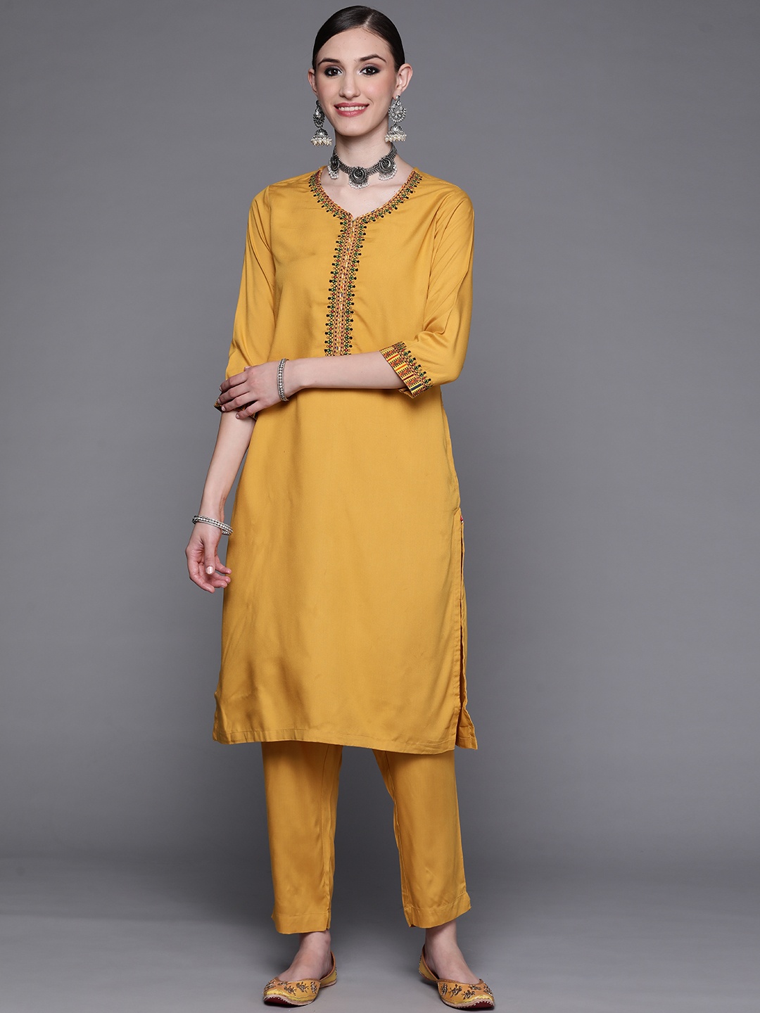 

Biba Women Mustard Yellow & Black Ethnic Motifs Embroidered Kurta with Trousers
