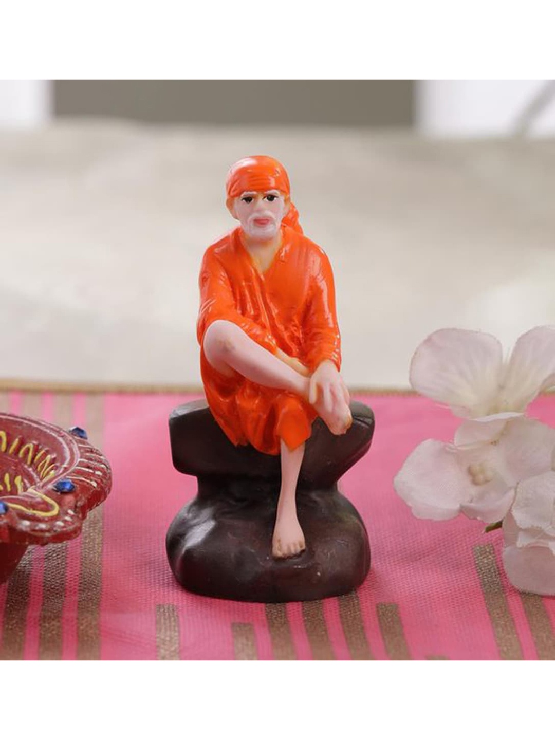 

Gallery99 Orange & Brown Handpainted Dwarka Sai Baba Decorative Showpiece Idol